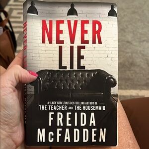 'Never Lie' Book - Black and White Cover
